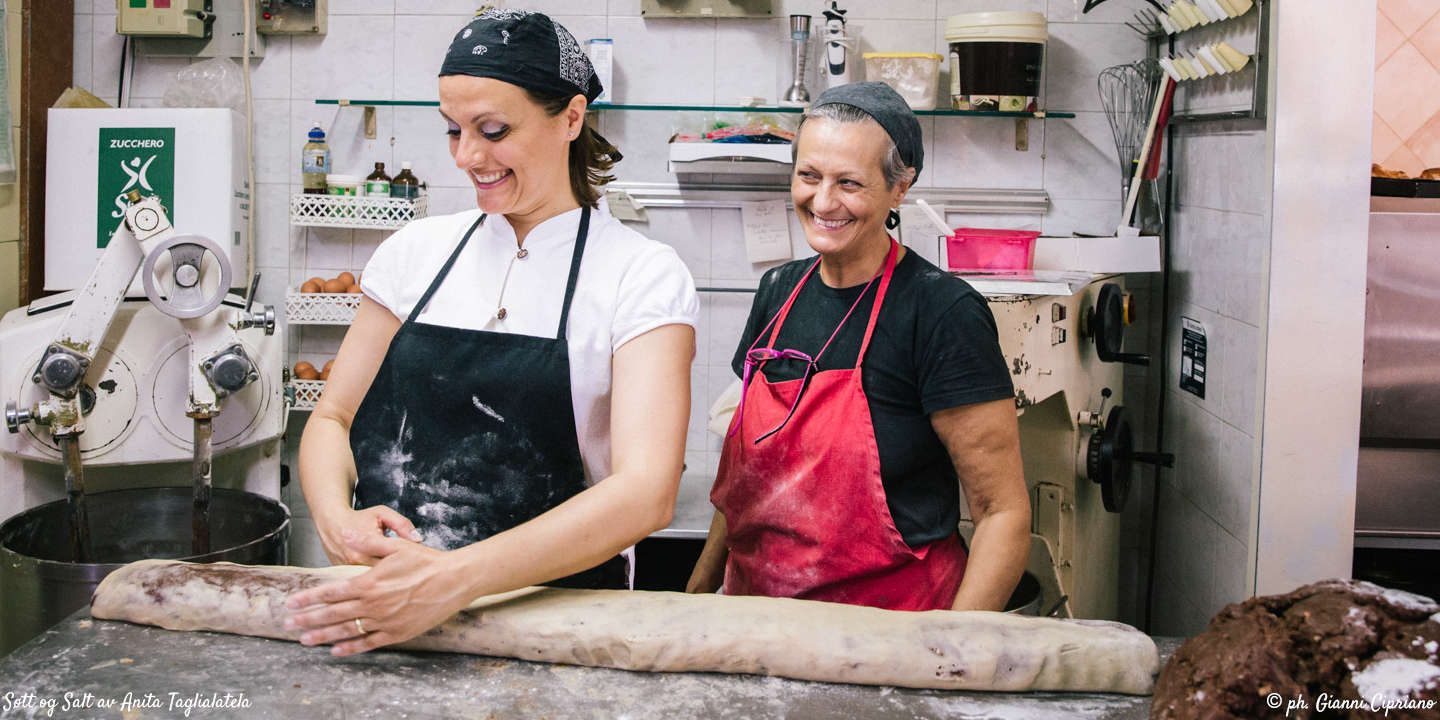 NAPLES, ITALY - 7 JUNE 2018: (L-R) Sisters Anita and Lucia Tagliatela prepare amarena cookies here at Pasticcielo, a bakery in Naples, Italy, on June 7th 2018.

Pasticciello was founded 34 years ago by Lucia Tagliatela.